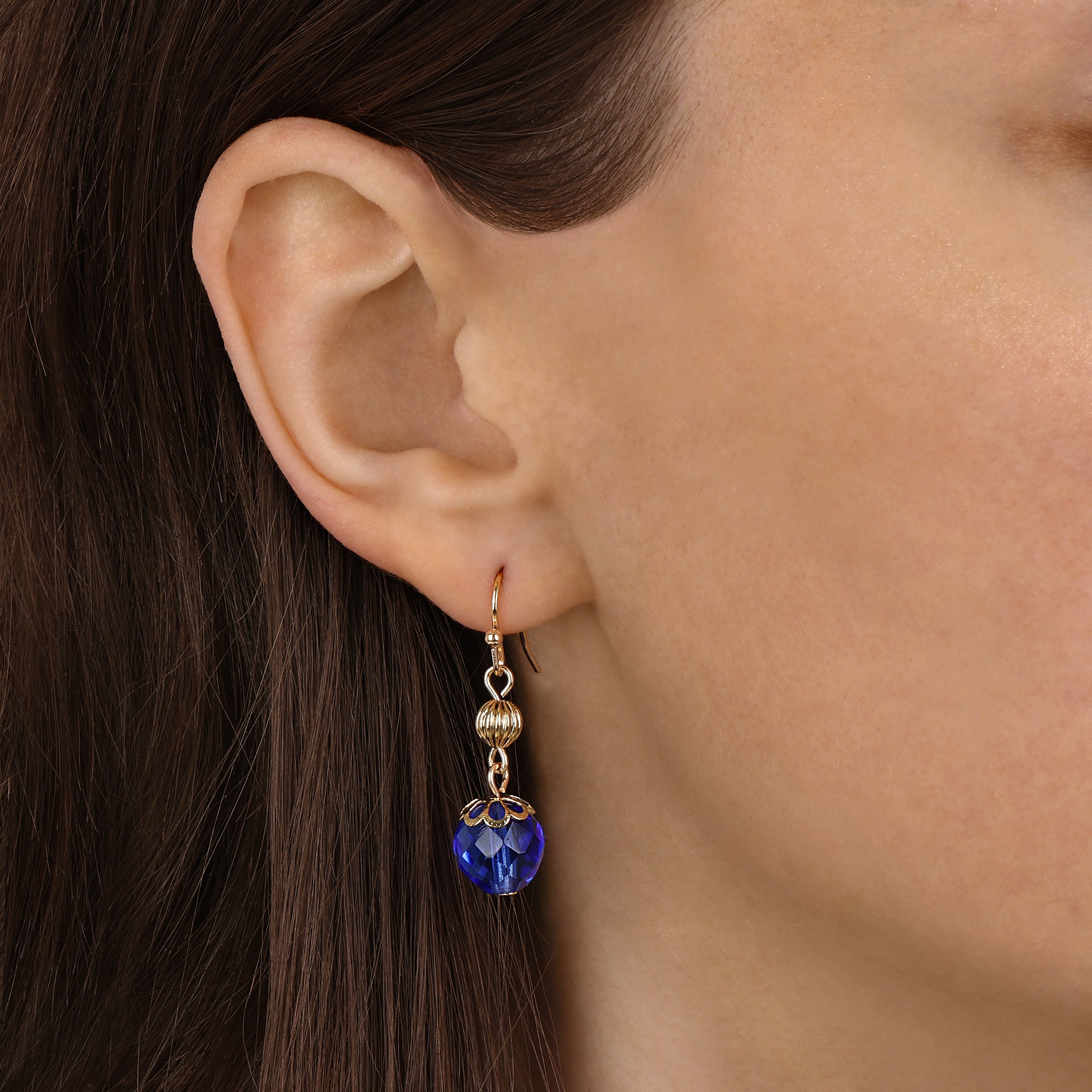Woman wearing Gold and Blue Shore Crystal Beaded Dangling Earrings