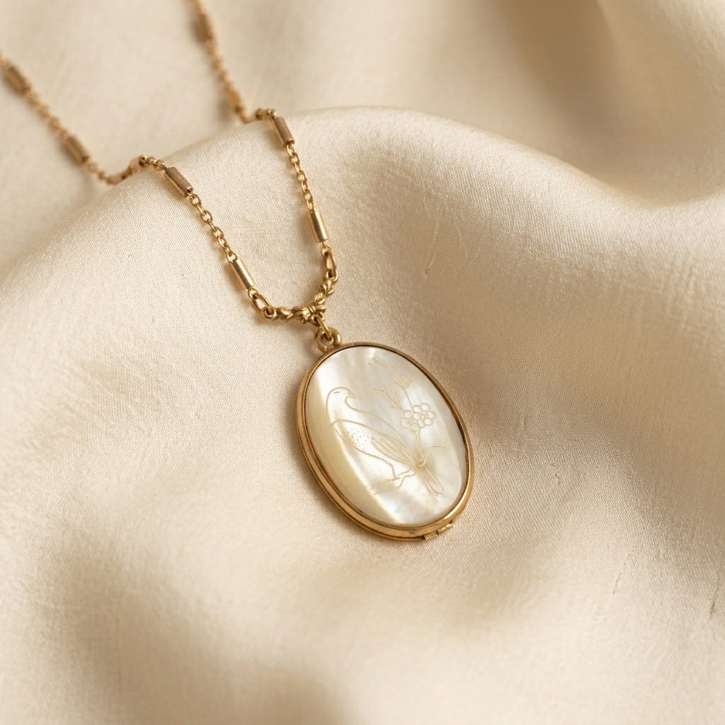Gold necklace with a pendant on a beige fabric background