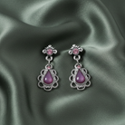 Amethyst Teardrop Moonstone & Crystal Drop Earrings on a sage green background