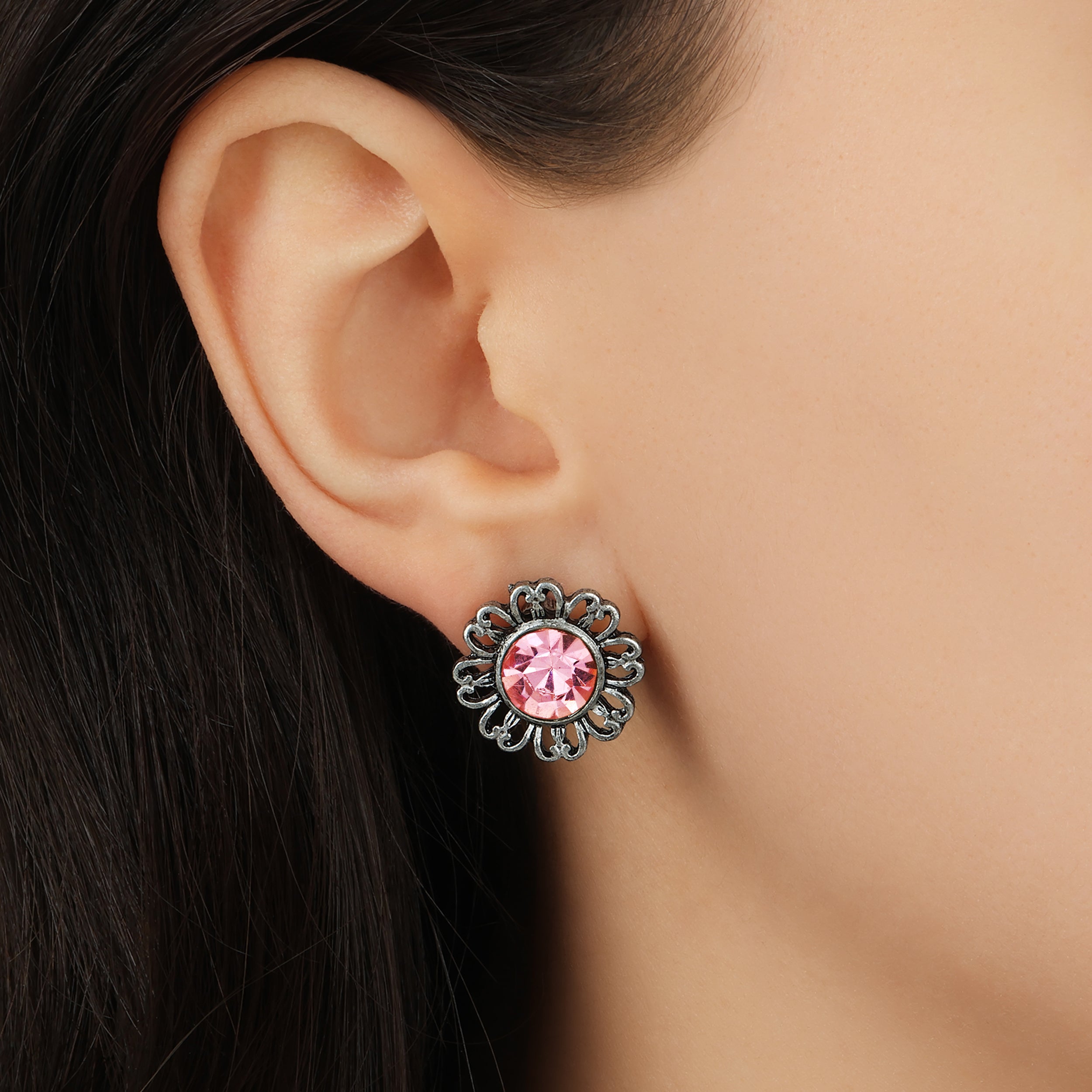 Close up of a model wearing Floral Shaped Pewter & Colorful Light Pink Crystal Post Stud Earrings