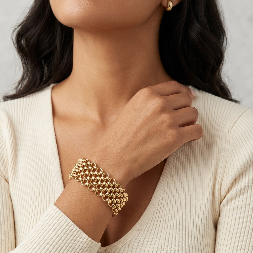 Woman wearing a Polished Gold Mesh Chain Bracelet