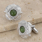 Round Green Jade Gemstone Cufflinks on a stone surface