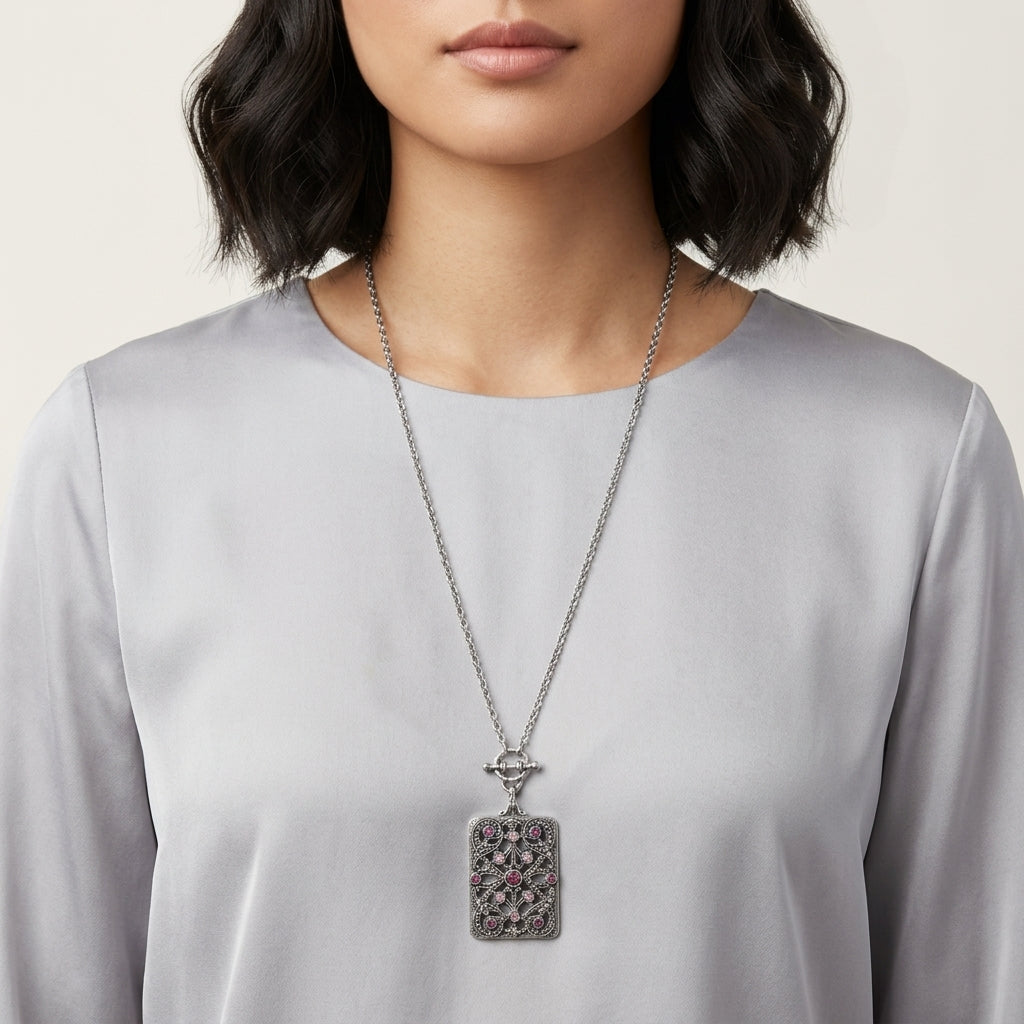 Person wearing a silver tone Purple Amethyst Crystal Filigree Mirror Pendant Necklace