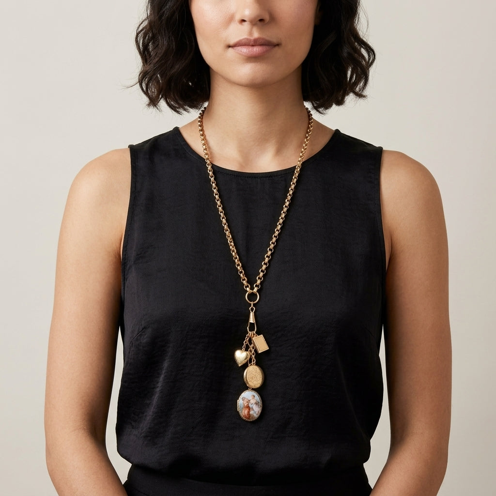 Woman wearing a gold tone Victorian Art Locket Plus Book & Heart Lockets Necklace