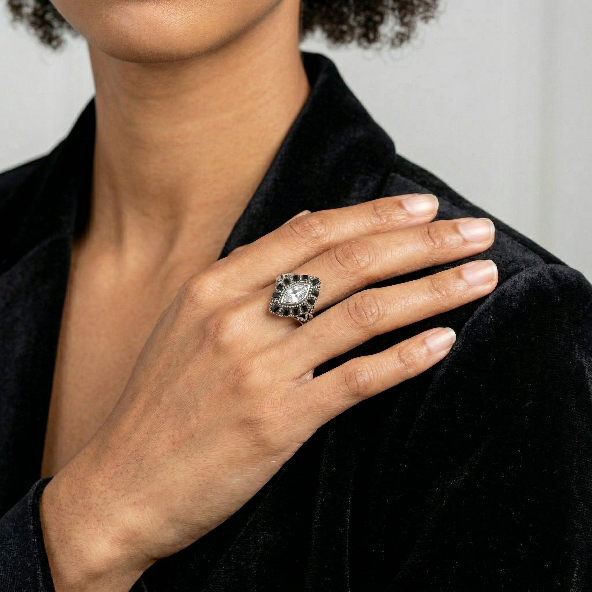 Hand wearing a Honora Hammered Jet Black & Clear Crystal Ring