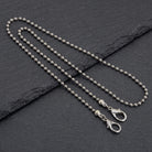 Stainless Steel 3.2mm Ball Chain Mask Holder on black stone surface