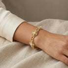 Woman wearing a Prestige Textured Link Crystal And Stone Bracelet
