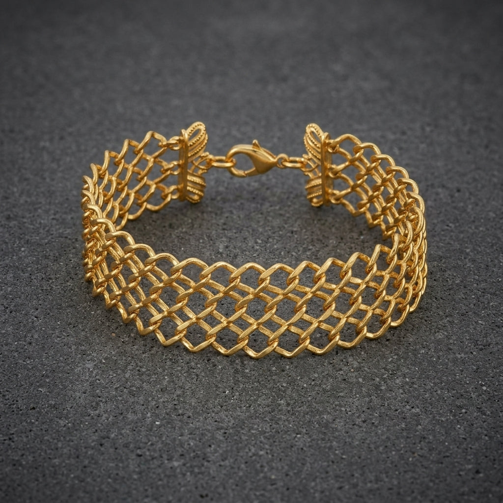 Gold bracelet with a mesh textured design on a dark gray background