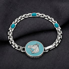 Southwest Turquoise Horse Head Brick Chain Bracelet on dark linen