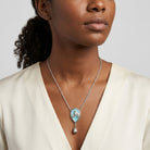 Woman wearing a Southwest Turquoise Horse Head Pendant Teardrop Necklace