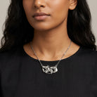 Woman wearing a Horse Herd Pendant Necklace 