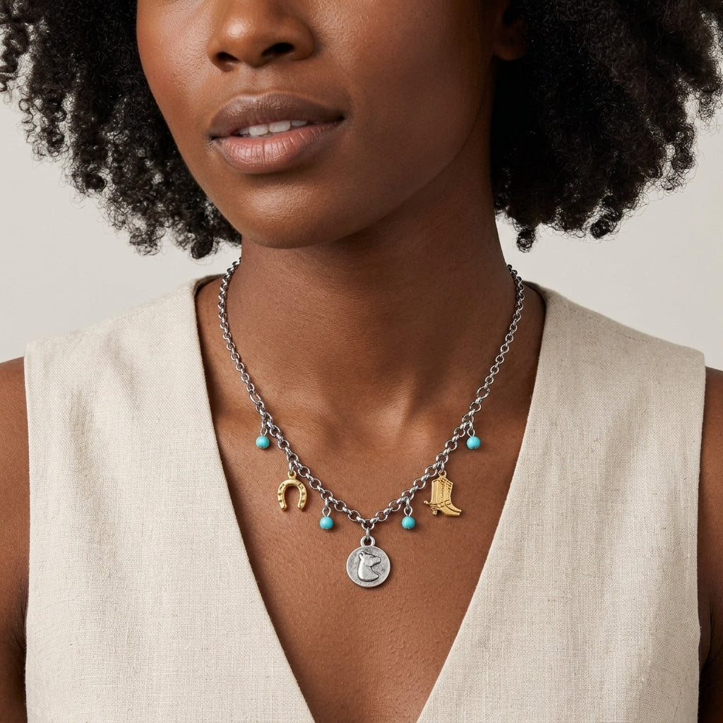 Southwest Turquoise Bead Multi Charm Necklace on a woman in a cream top 