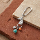 Horse Multi Bead Carabiner Key Chain on stone surface