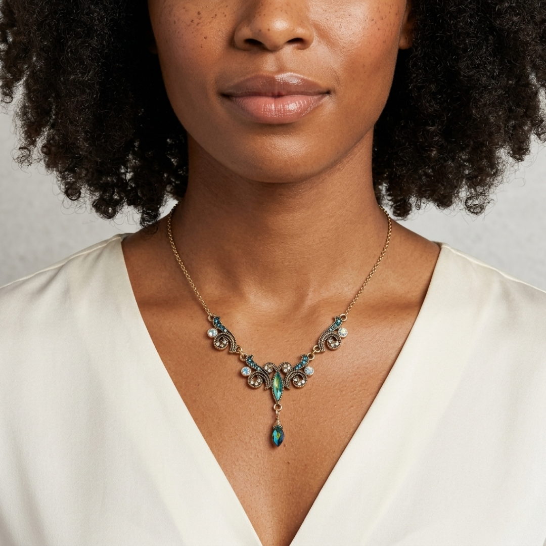 Woman wearing a decorative peacock plumage necklace with a neutral background