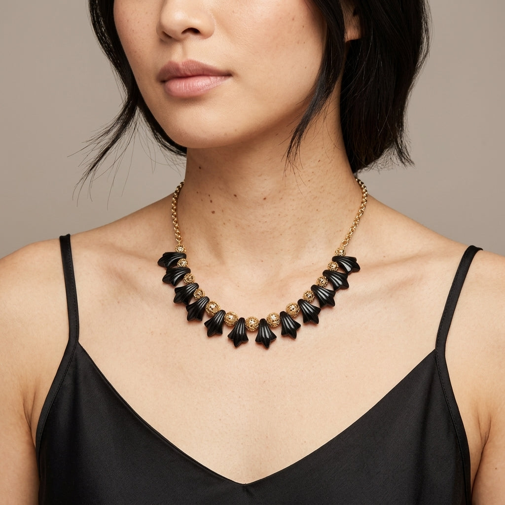 Woman wearing a Black Tulip Flower Filigree Puff Bead Necklace