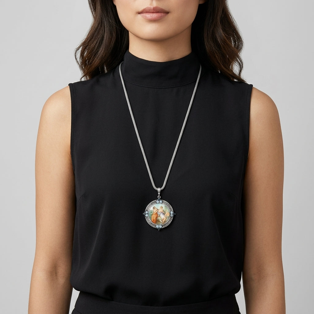 Woman wearing a black sleeveless top with Blue Crystal Rubenesque Glass Pendant Mesh Necklace