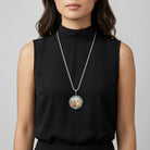 Woman wearing a black sleeveless top with Blue Crystal Rubenesque Glass Pendant Mesh Necklace