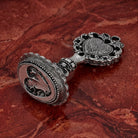Filigree Heart Wax Seal Stamp on a red marbled background