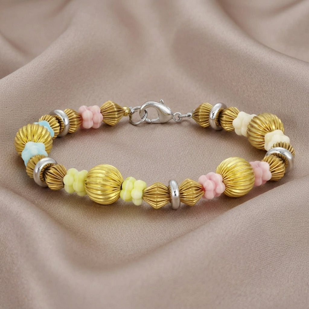 Vintage Multicolored Flower Power Bead Bracelet on a beige fabric background