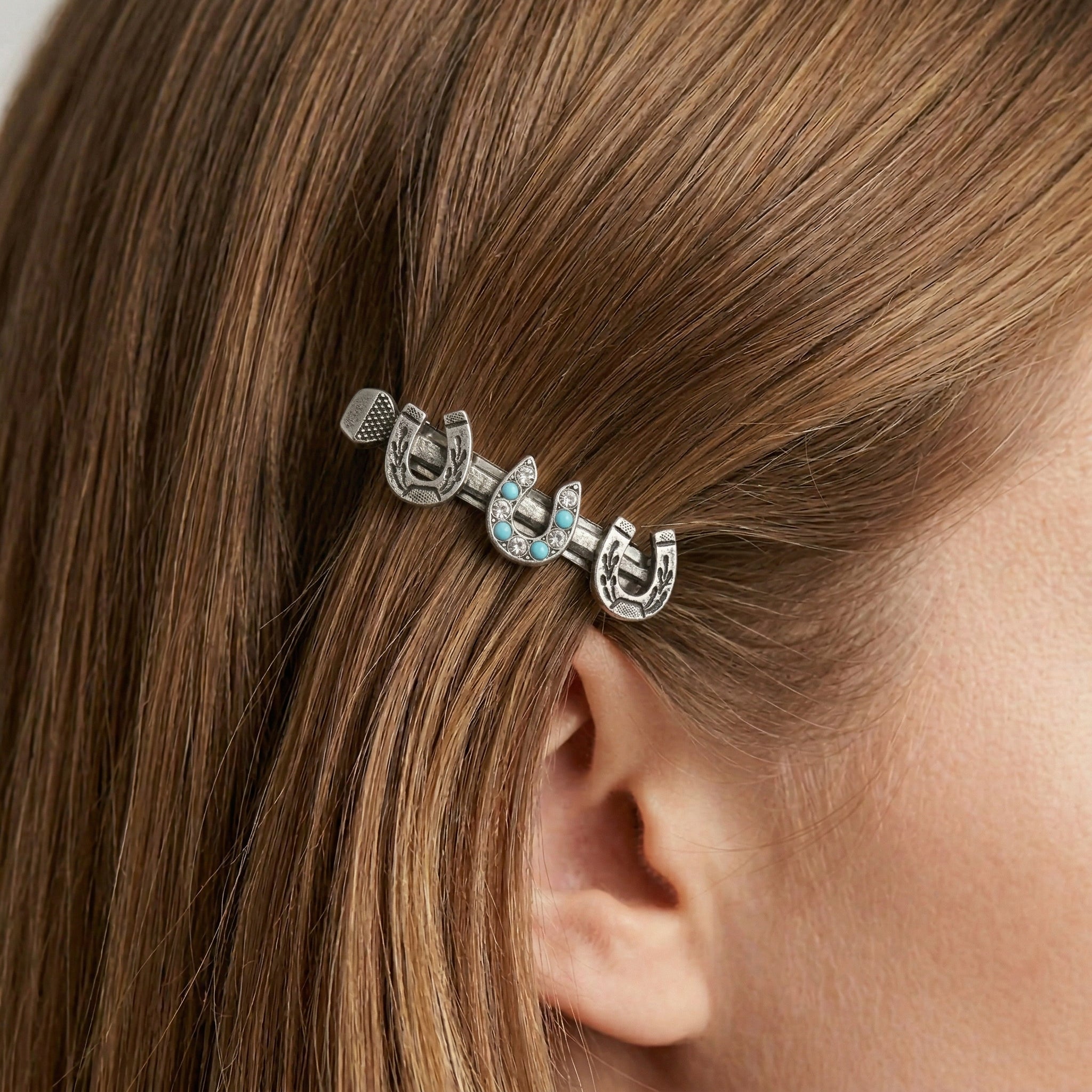 Triple Lucky Horseshoe Turquoise European Crystal Hair Barrette worn in a model's hair