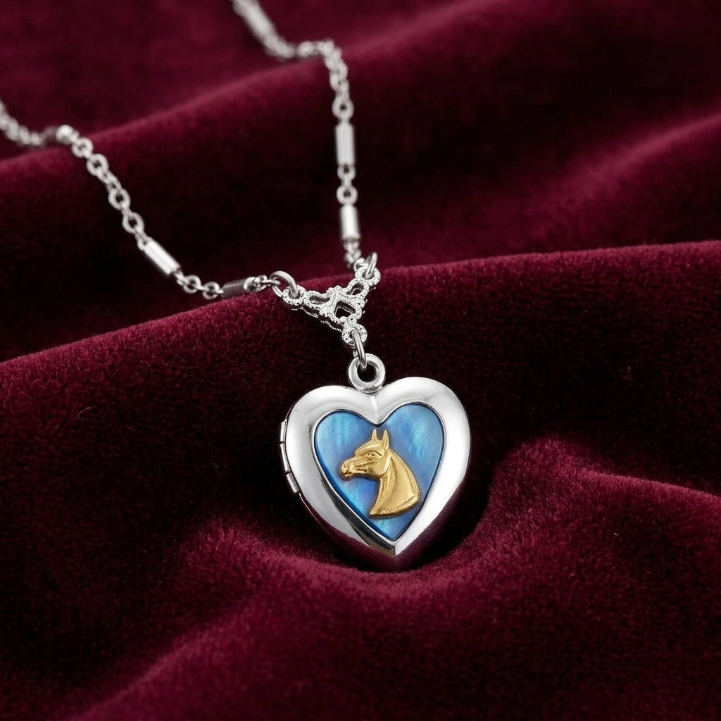 Sapphire Blue Horse Heart Locket Necklace on a red velvet background