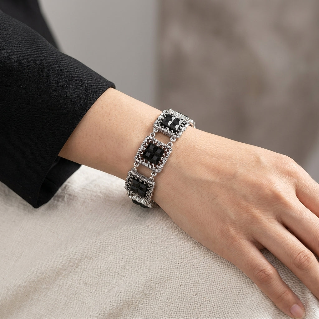 Silver tone Deco Filigree Square Glass Stone Bracelet on a woman's wrist