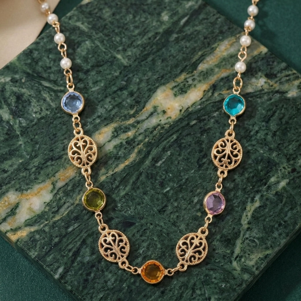 Multicolor Euro Channel Crystal Faux Pearl Necklace on green marble