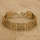 Meso Round Intricate Filigree Link Bracelet on a beige background