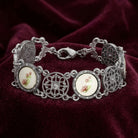 Meso Round Intricate Filigree Pink & White Stone Link Bracelet on dark red fabric
