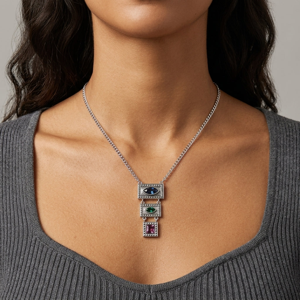 Multi Austrian Crystal Linear Drop Pendant Necklace worn by a woman with a gray top 