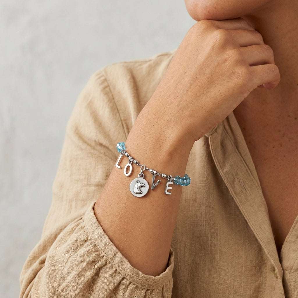 Woman wearing Horse Head Charm "LOVE" Aqua Bead Stretch Bracelet