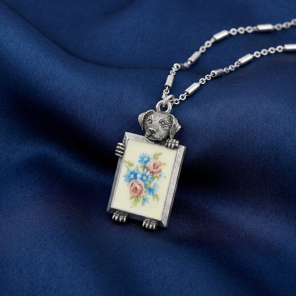 Dog Pendant Grecian Windflowers & Roses Decal Necklace on a blue fabric background