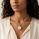 Woman wearing our White Garden Porcelain Rose Faux Pearl Necklace 