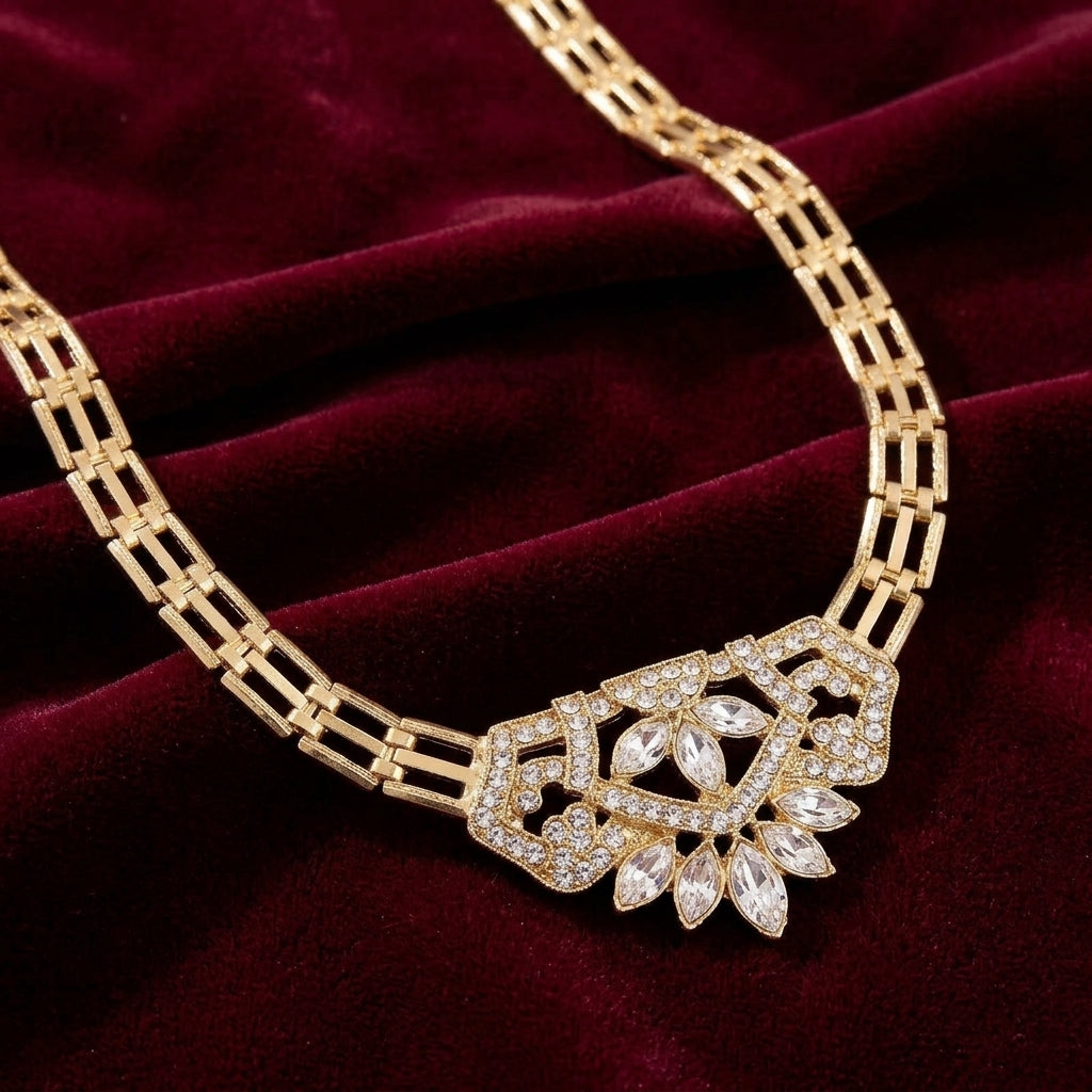 Genevieve Crystal Brick Link Necklace resting on red fabric surface