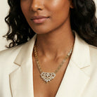 Woman in a cream blazer wearing our Genevieve Crystal Brick Link Necklace 
