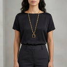 Woman wearing our Black Ol' Family Album Stone Locket Necklace 