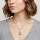 Woman wearing a Navette Crystal Antiqued Drop Necklace