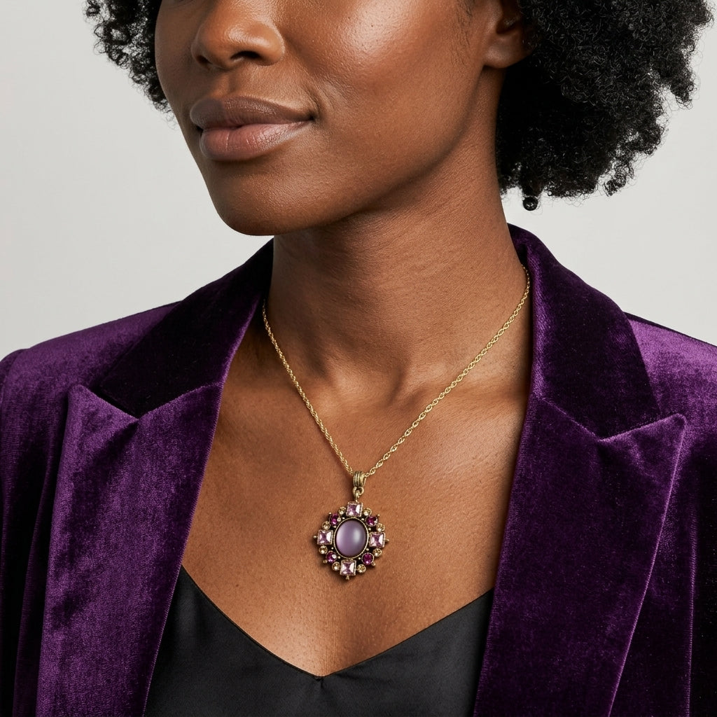 Woman in a purple blazer wearing a matching purple Multi Crystal And Oval Stone Pendant Necklace