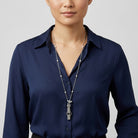Woman in a blue collared shirt wearing our Golf Club Set Whistle Pendant Faux Pearl Necklace