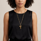 Woman in a black outfit wearing a Vintage Bike & Functional Whistle Gold Tone Necklace 