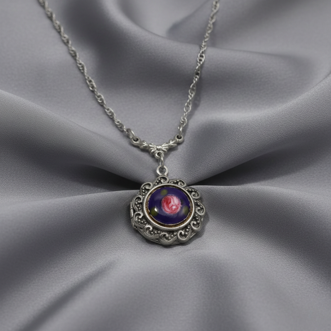 Necklace with a floral pendant on a gray fabric background