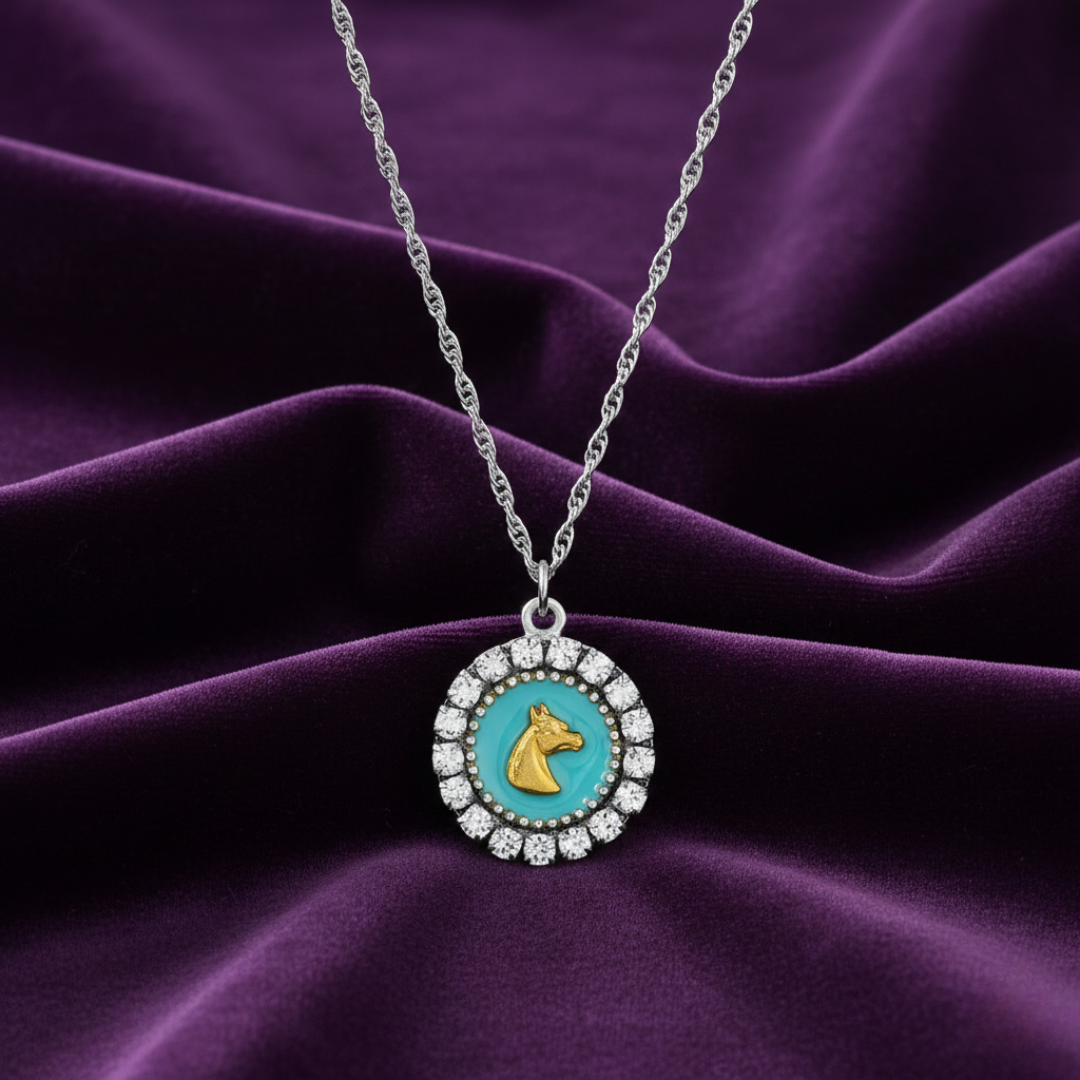 Necklace with a horse head pendant on a purple fabric background