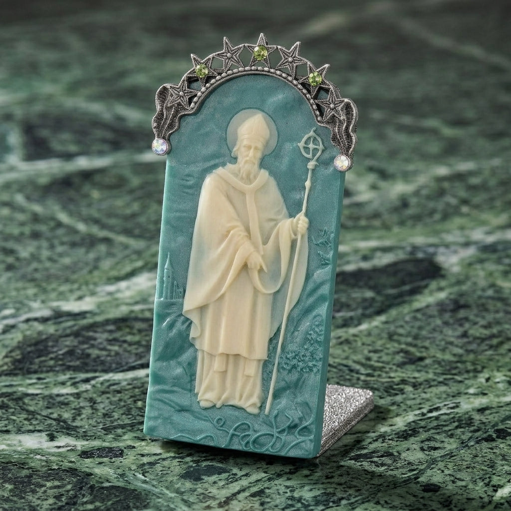 Decorative tabletop plaque with a Saint Patrick figure on a green marble background