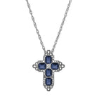 Silver cross necklace with blue crystals on a white background
