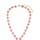 Zoomed in on the lobster clasp closure of our Symbols Of Faith Peach Rose AB Beaded Cross Pendant Necklace 17" + 3" Extension