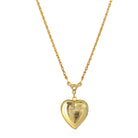Luminous gold tone backing of the Red Enameled Heart & Crystal Cross Locket Necklace 18"