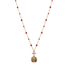 Necklace with red beads and a gold pendant on a white background