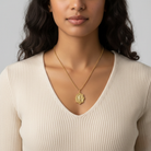 St. Christopher gold necklace with a pendant of Child and faith inscription on a 1.5mm ball chain.